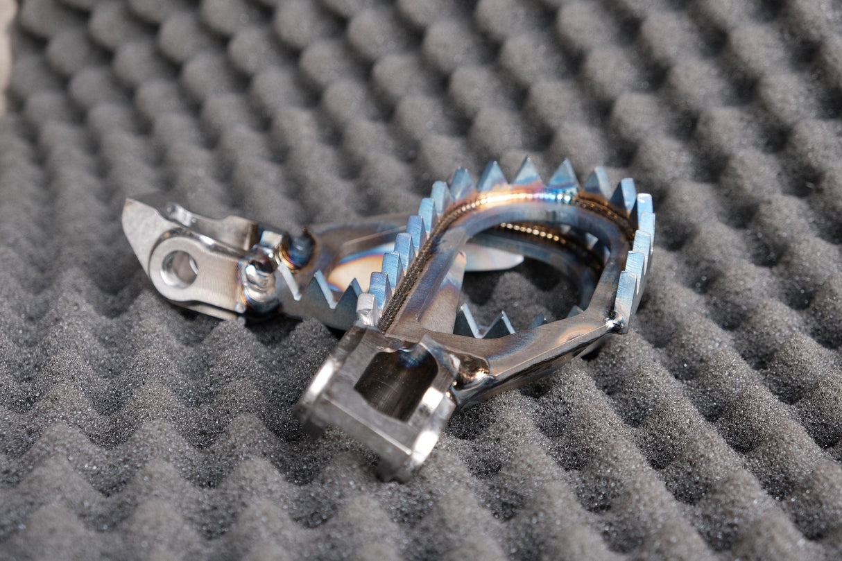 RamX Titanium Footpegs 2024/2025 KTM/HUSQVARNA/GASGAS (5mm down / 5mm back)