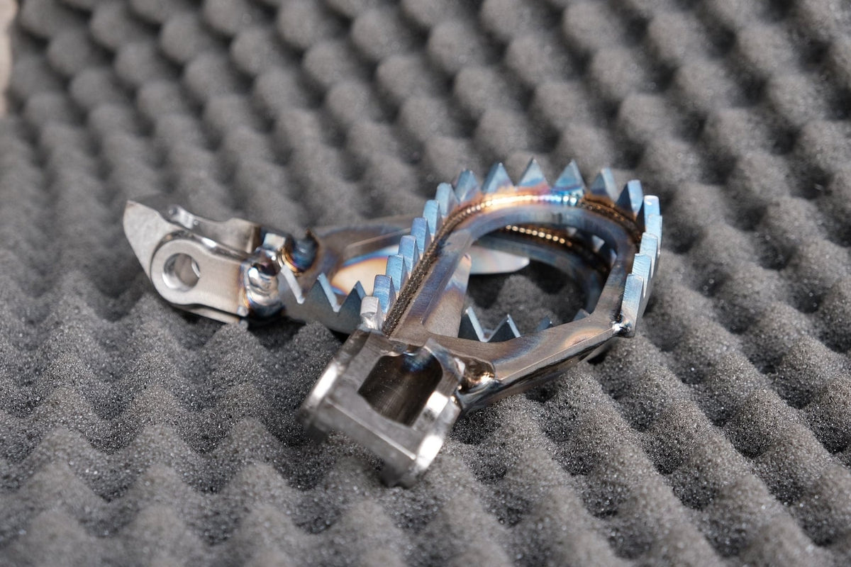 RamX Titanium Footpegs 2024/2025 KTM/HUSQVARNA/GASGAS (5mm down / 5mm back)