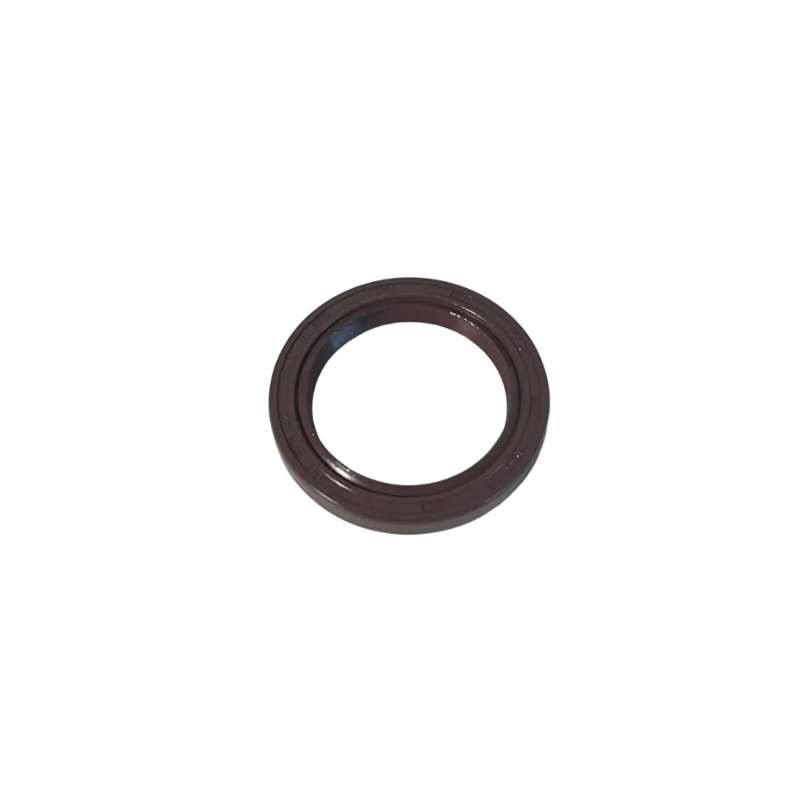 A dark brown circular rubber seal or gasket resting on a scratched white surface.